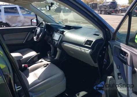 2014 Subaru Forester 2.5I Limited z USA, uszkodzony, nr VIN JF2SJAHC0EH538010